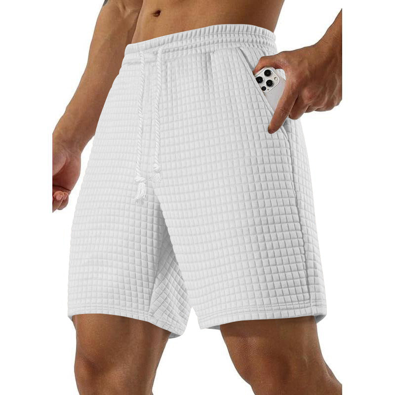 Shorts de sport pour hommes en material respirant avec poches latérales pratiques Chic und Stil