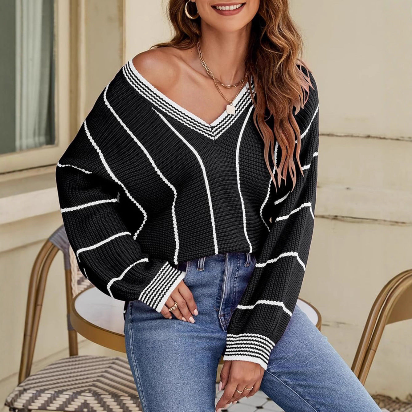 Pull femme décontracté à col en V avec motif rayé Chic und Stil