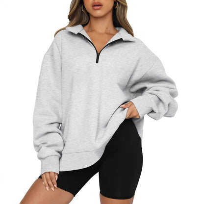 Pull décontracté pour femmes avec demi-zip et épaules tombantes Chic und Stil