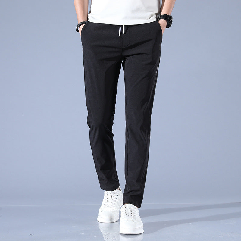 Men's sports pants with adjustable drawstring and zippered pockets on the sides Chic and Style