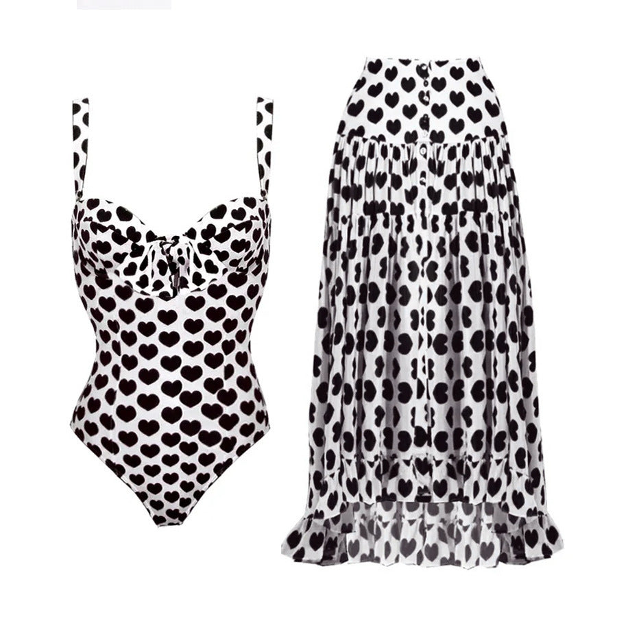Chic and Style ladies swimsuit and skirt set with heart pattern