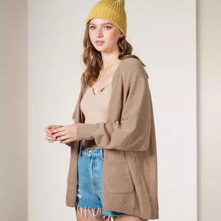 Dames Pull en tricot douillet avec poches latérales et devant ouvert Chic und Stil