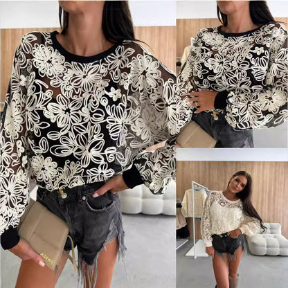 Blouse pour femmes brodée avec des manches transparentes Chic und Stil