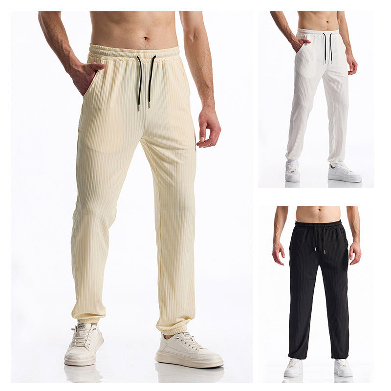 Comfortable sports pants for men with elastic waistband and chic striped design