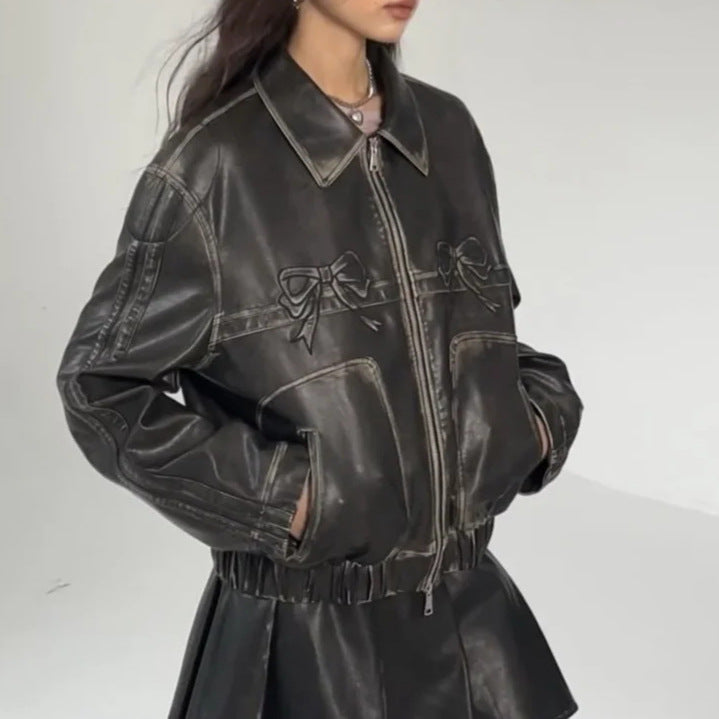 Synthetic leather jacket for women with ruffles and elastic hem Chic and Style