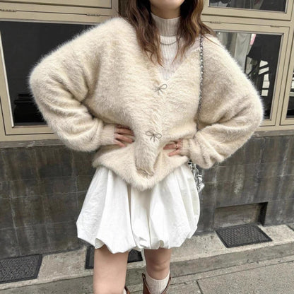 Dames Pull en maille pelucheux avec des détails de boutons élégants Chic und Stil