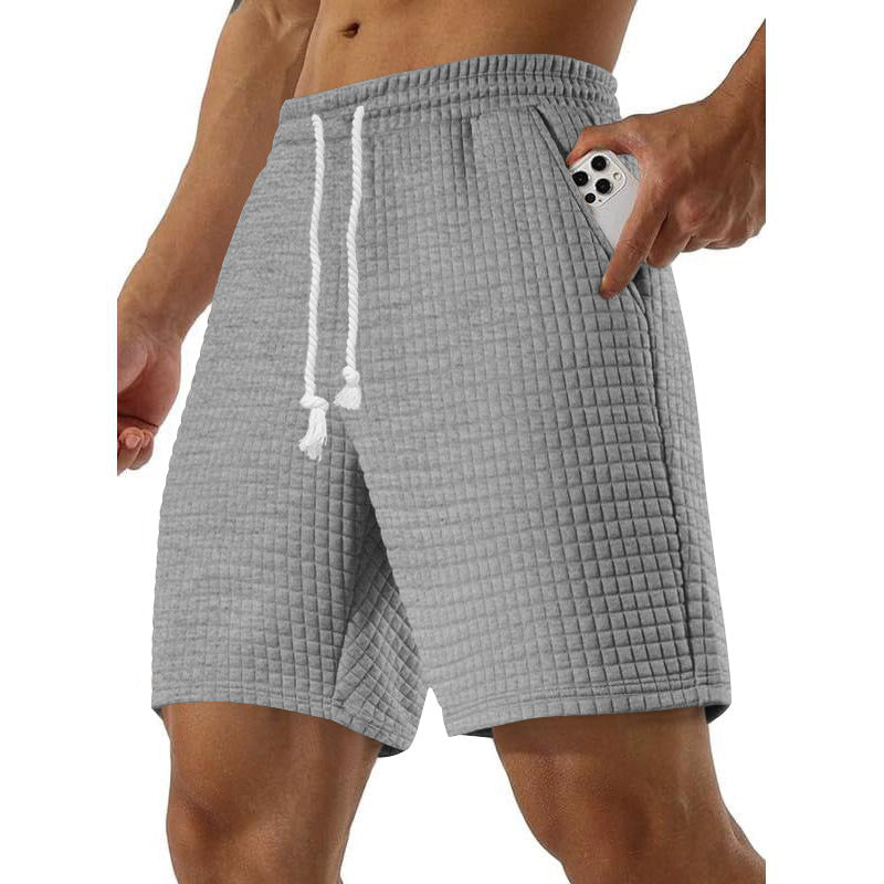 Shorts de sport pour hommes en material respirant avec poches latérales pratiques Chic und Stil