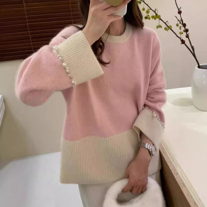 Pull en tricot à la mode pour femmes avec des manches ornées de perles Chic und Stil