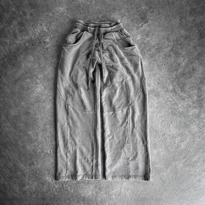 Pantalons en tissu décontractés pour femmes avec taille élastique et poches latérales volumineuses Chic & Stil