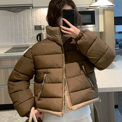 Dames courte veste de loisirs matelassée avec poches zippées latérales Chic und Stil