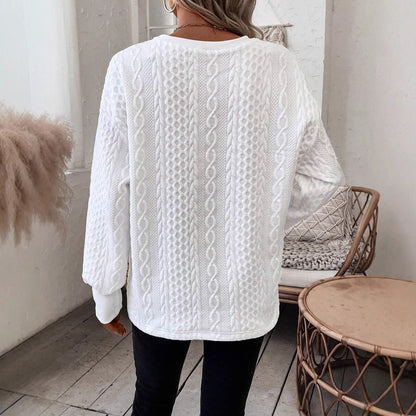 Pull en tricot pour femmes avec un profond décolleté en V et un motif texturé Chic und Stil