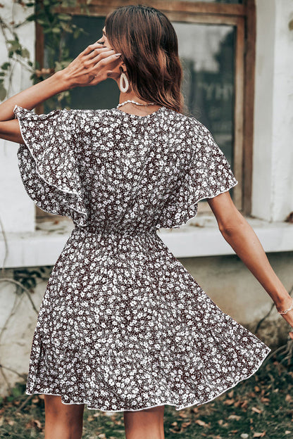 Dames Robe Twirl à manches flottantes fleuries Chic und Stil
