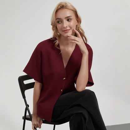 Dames cardigan à la mode avec décolleté en V profond et élégante patte de boutonnage Chic und Stil