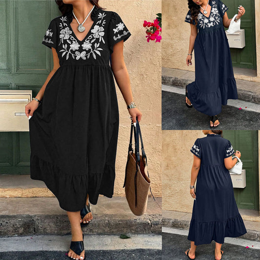 Robe maxi pour femmes avec design floral brodé et jupe volumineuse Chic und Stil
