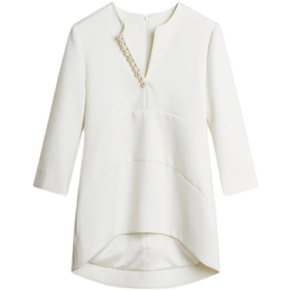 Blouse texturée élégante pour femmes avec détail de bouton décoratif Chic und Stil