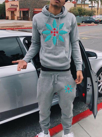 Chic and Style women's hoodie and jogger pants set with winter leaf pattern