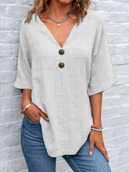 Blouse dames à col en V avec boutons décoratifs et coupe décontractée Chic und Stil