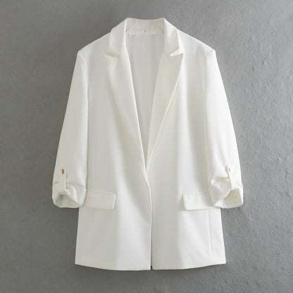 Elegant blazer jacket for women with structured sleeves and discreet golden accents Chic and Style