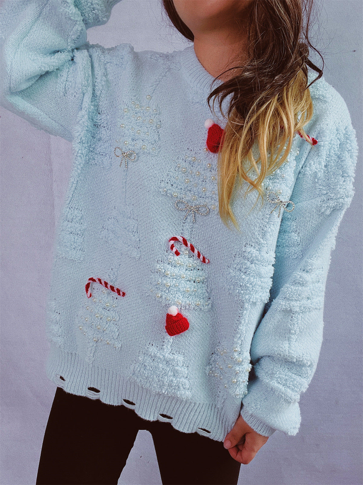 Pull over de fête pour dames avec des motifs de Noël créatifs et un design texturé Chic und Stil