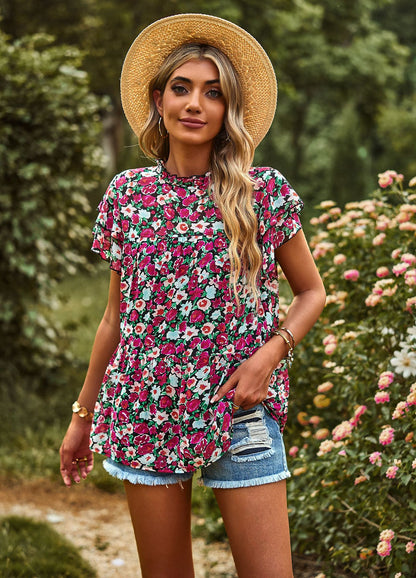 Dynamic feminine blouse with ruffle details and floral design Chic und Stil
