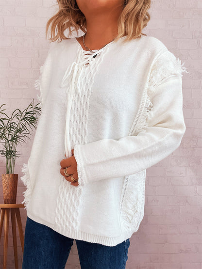 Pull en tricot oversize pour femmes avec un design de franges ludique et un motif en torsades Chic und Stil