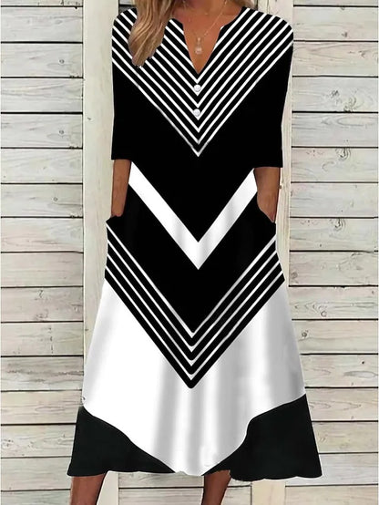 Robe mode femme avec décolleté en V et motif rayé graphique Chic und Stil
