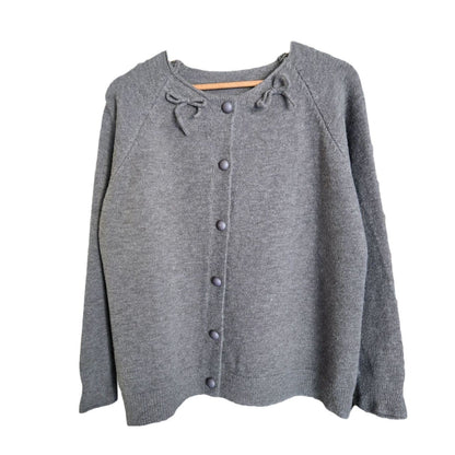 Dames Pull-over douillet avec des nœuds décoratifs et de grands boutons Chic und Stil