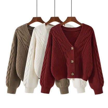 Dames pull-over en tricot douillet avec motif en torsade et fermeture à bouton Chic und Stil