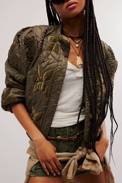 Dames blouson matelassé avec design floral et bords élastiques Chic und Stil