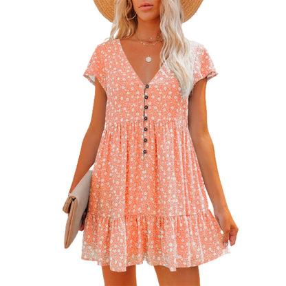 Robe d'été pour femmes avec des motifs floraux et des détails de boutons Chic und Stil