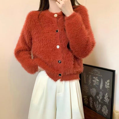Dames cardigan doux avec boutons et texture en fausse fourrure Chic und Stil