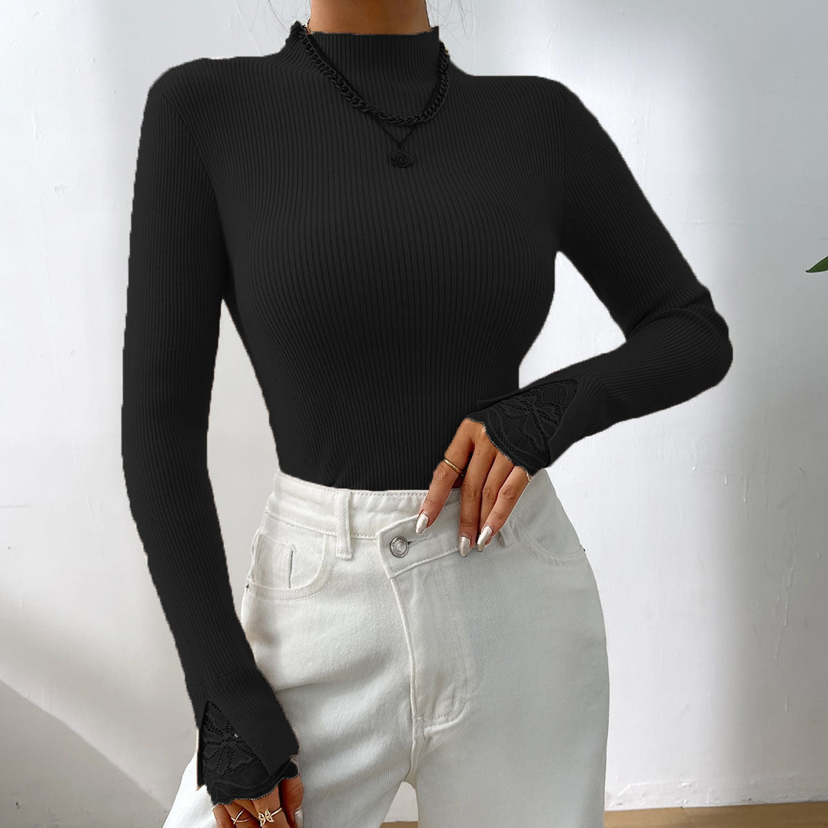 Pull long à manches longues pour femmes avec des manches en dentelle et coupe ajustée Chic und Stil
