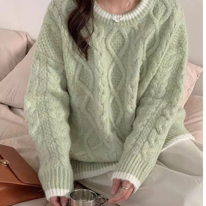Pull en grosse maille pour femmes avec motif torsadé et finition de col contrastante Chic und Stil