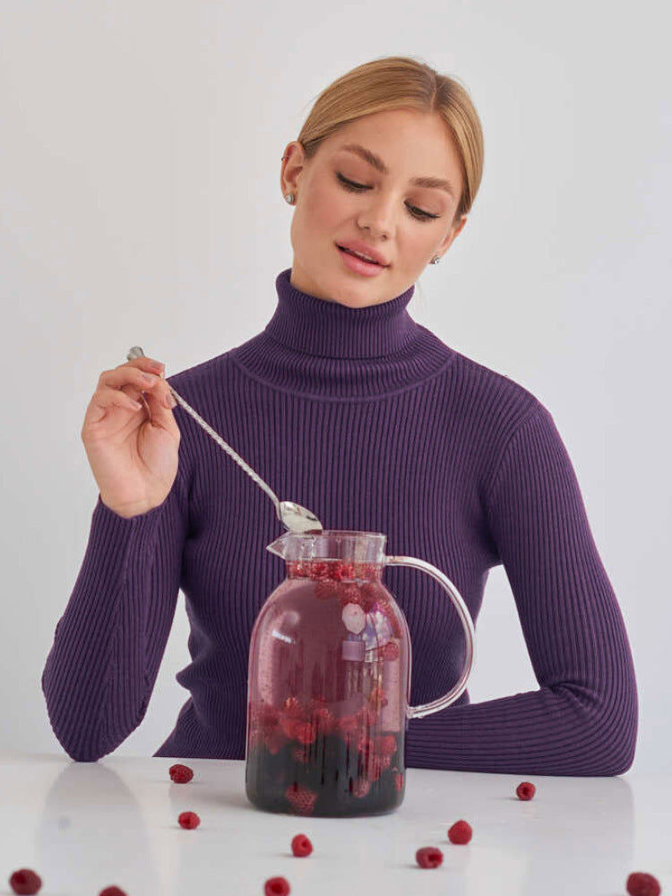 Pull-over à col roulé pour dames avec un design côtelé et une coupe décontractée Chic und Stil