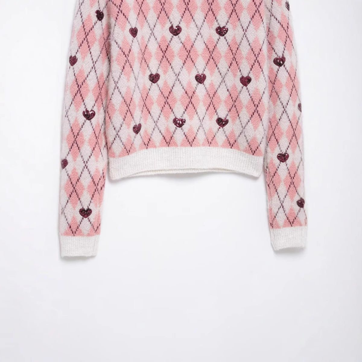 Pull femme avec motif en forme de cœur et éléments scintillants Chic und Stil