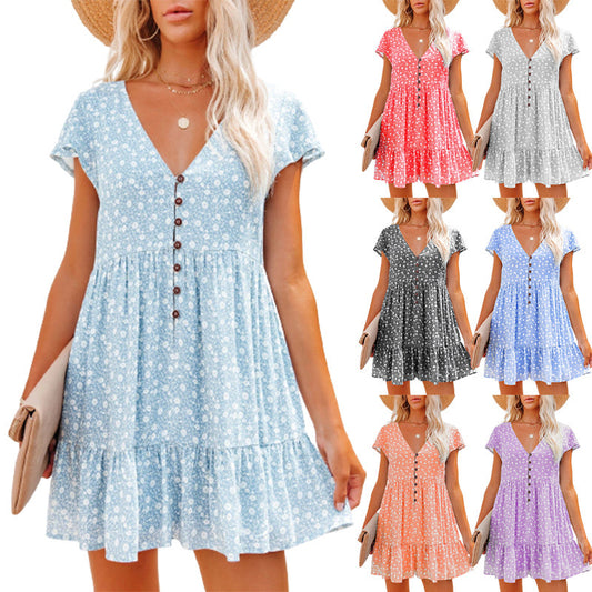 Robe d'été pour femmes avec des motifs floraux et des détails de boutons Chic und Stil