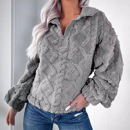 Pull en fleece douillet pour femmes avec demi-fermeture éclair et manches bouffantes Chic und Stil
