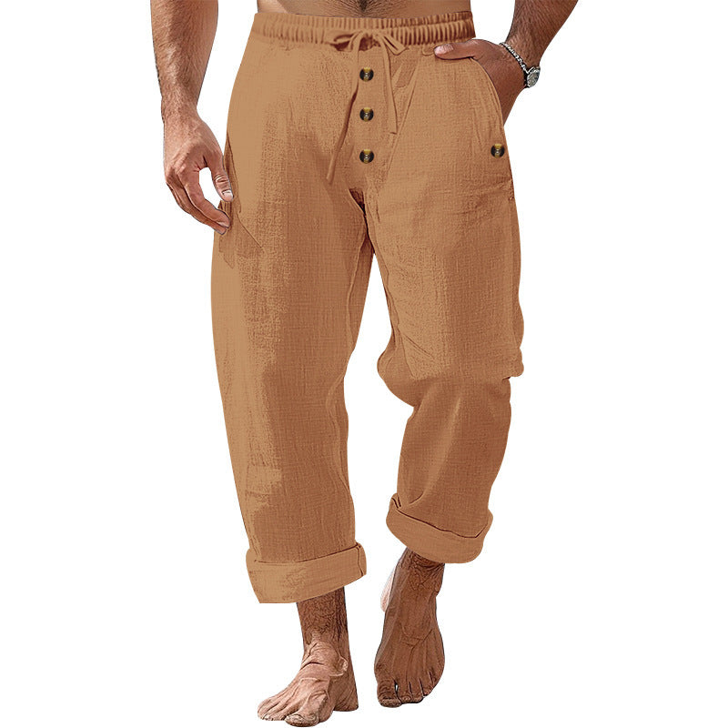 Casual beach pants for men with elastic waistband and practical button details Chic and Style