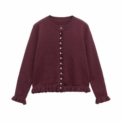 Dames cardigan en tricot confortable avec des boutons décoratifs et un design à volants tendance Chic und Stil