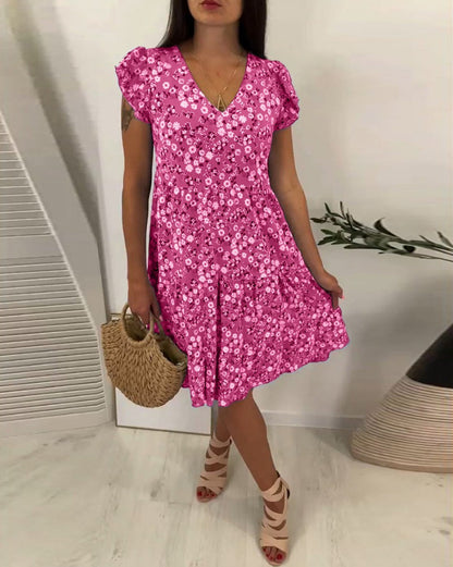 Robe de loisirs pour femmes avec design floral et décolleté en V Chic und Stil