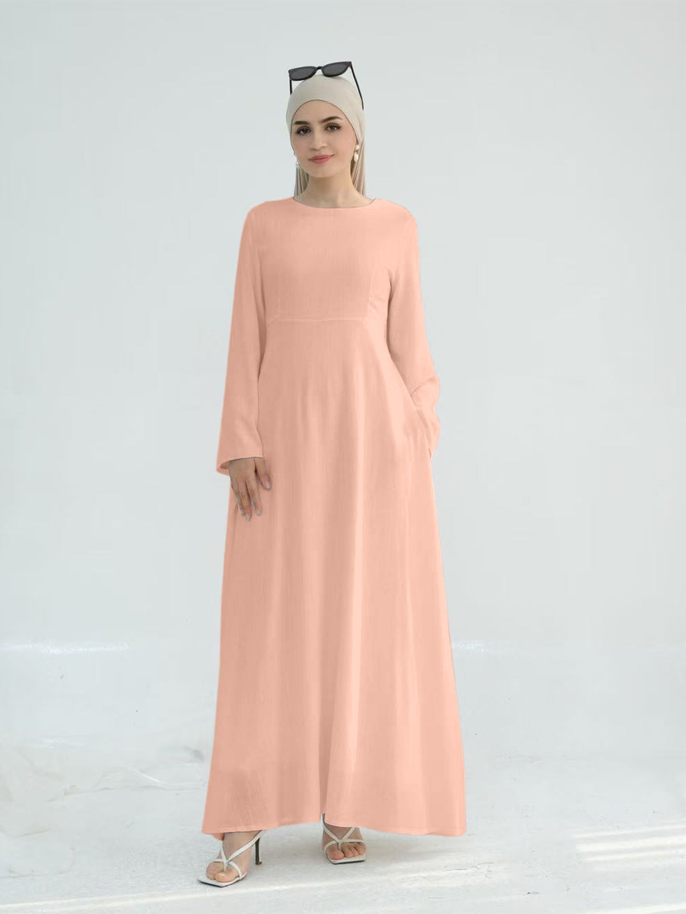 Robe maxi élégante pour dames avec des manches longues et des poches latérales Chic und Stil