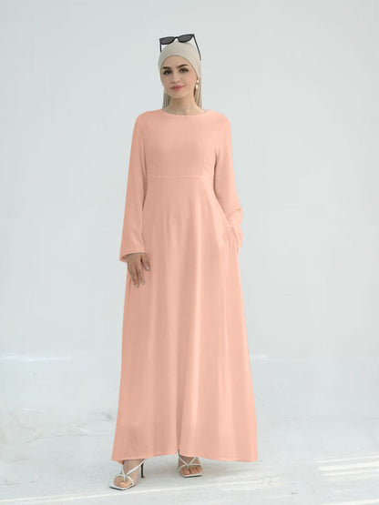Robe maxi élégante pour dames avec des manches longues et des poches latérales Chic und Stil