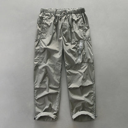 Functional pants for men with elastic waistband and zippered side pockets Chic and Style
