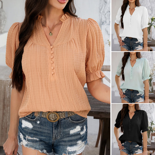 Blouse femme avec des manches bouffantes et des boutons décoratifs Chic und Stil