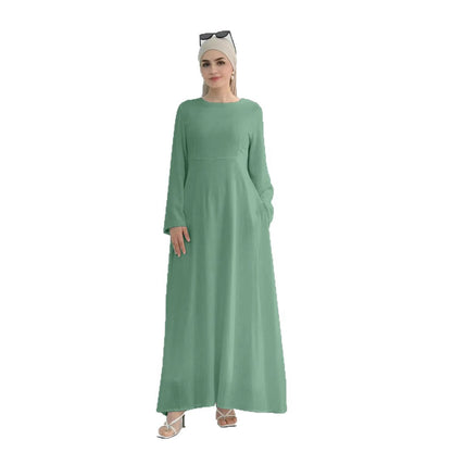 Robe maxi élégante pour dames avec des manches longues et des poches latérales Chic und Stil