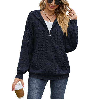 Dames Pull à capuche surdimensionné avec motif texturé et poches pratiques Chic und Stil