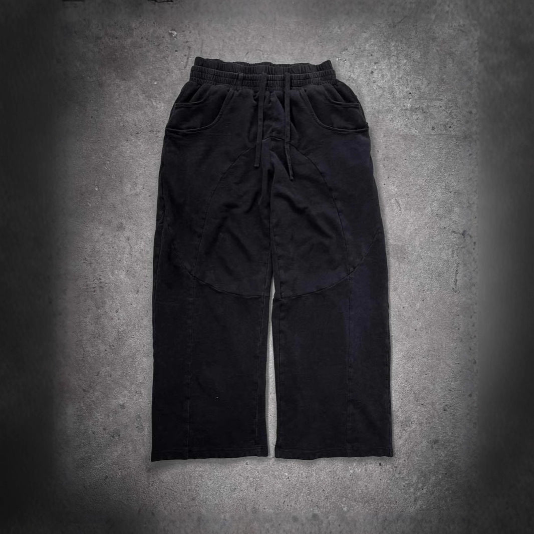 Pantalons en tissu décontractés pour femmes avec taille élastique et poches latérales volumineuses Chic & Stil