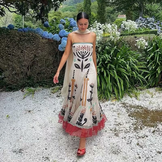 Robe maxi pour femmes avec imprimé floral et ourlet à volants Chic und Stil