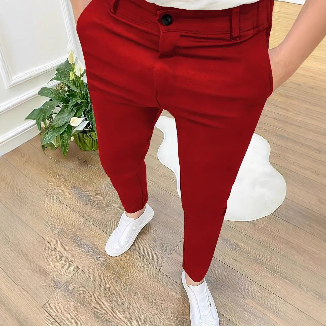 Trendy slim-fit pants for men with elastic waistband and practical pockets Chic and Style