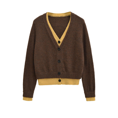 Pull élégant pour femmes avec décolleté en V profond et boutons décoratifs Chic und Stil